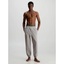 Pánské teplákové kalhoty NM2459E PET béžová - Calvin Klein