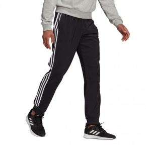 Pánské kalhoty Essentials Tapered Cuff 3 Stripes M GK8980 černé - Adidas