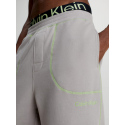 Pánské teplákové kalhoty NM2459E PET béžová - Calvin Klein