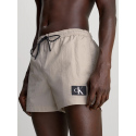 Pánské plavky KM0KM00979 PE0 béžové - Calvin Klein