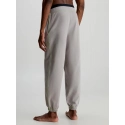 Pánské teplákové kalhoty NM2459E PET béžová - Calvin Klein